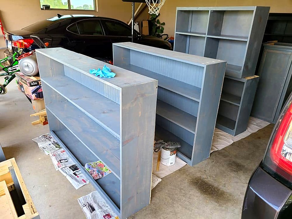 Bookcases, stained and drying