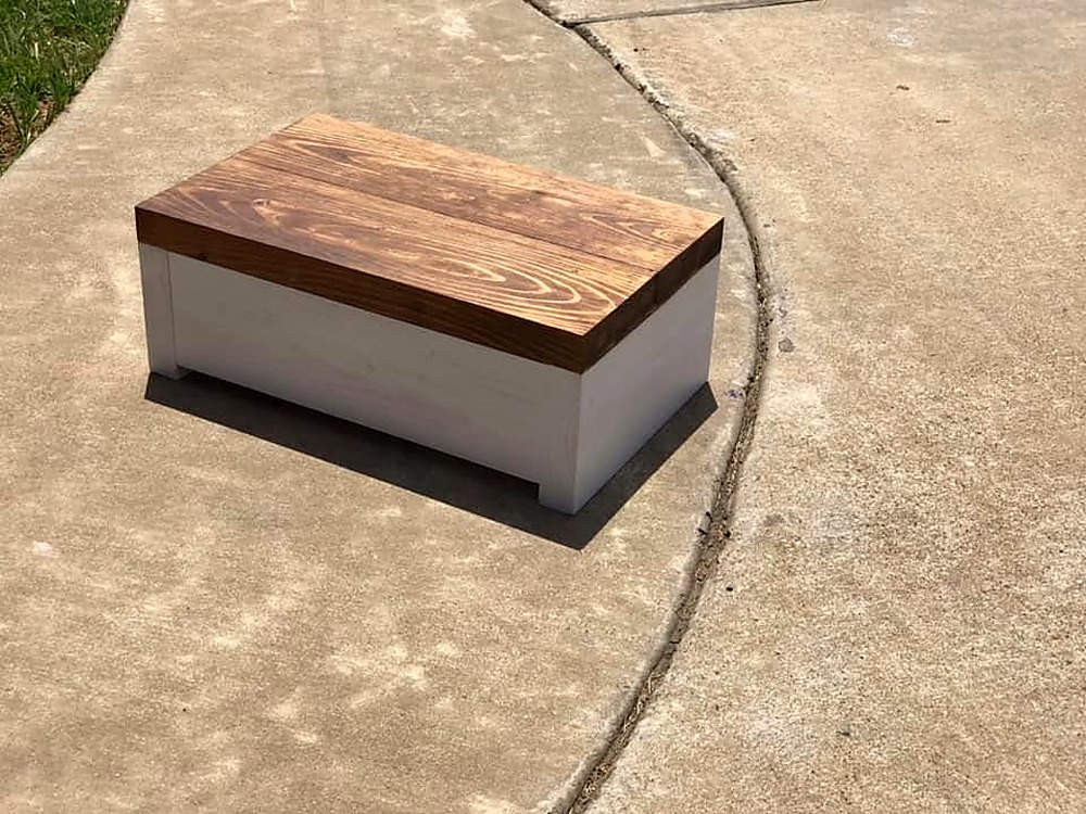 Storage box with stained lid